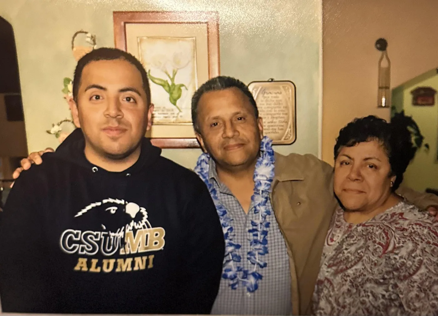 Three La Tortuga family members together in an older photograph